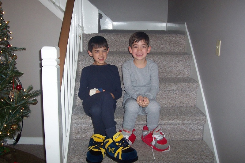 Nicholas Fillinger and Drew Fillinger on the steps Christmas Eve