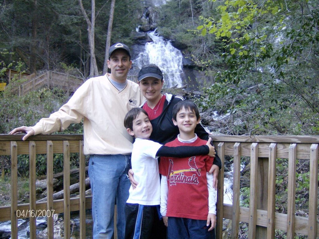 Eric Fillinger, Julie Fillinger, Drew Fillinger and Nicholas Fillinger in front of waterfall