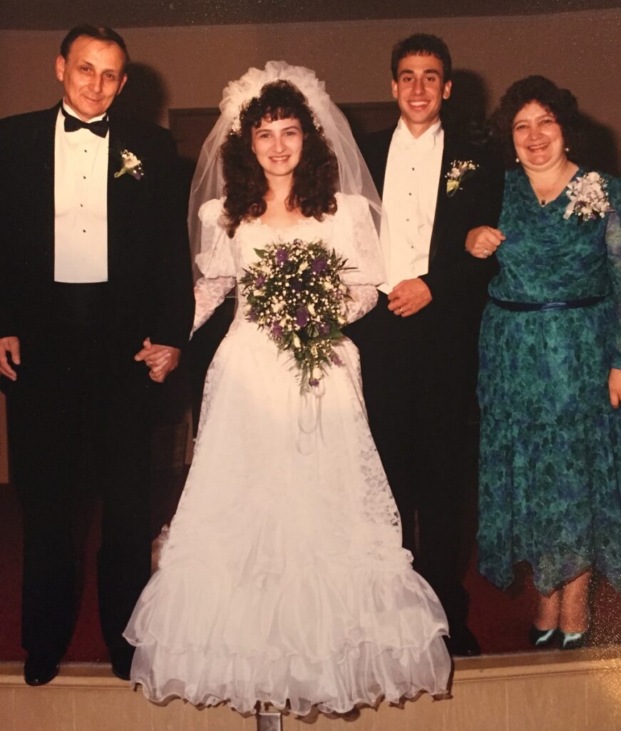 Julie Fillinger wedding picture with her mom and dad