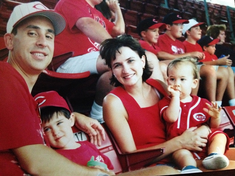 Eric Fillinger, Julie Fillinger, Nicholas Fillinger, Drew Fillinger sitting in the stands at the Reds game