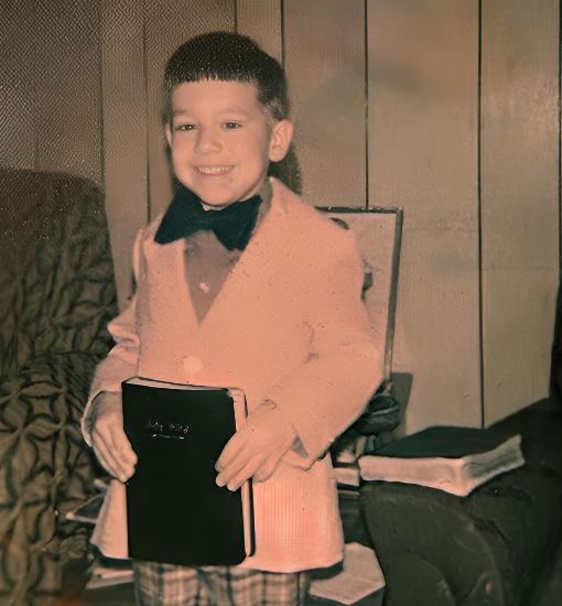 Young Eric Fillinger in bow tie ready for church