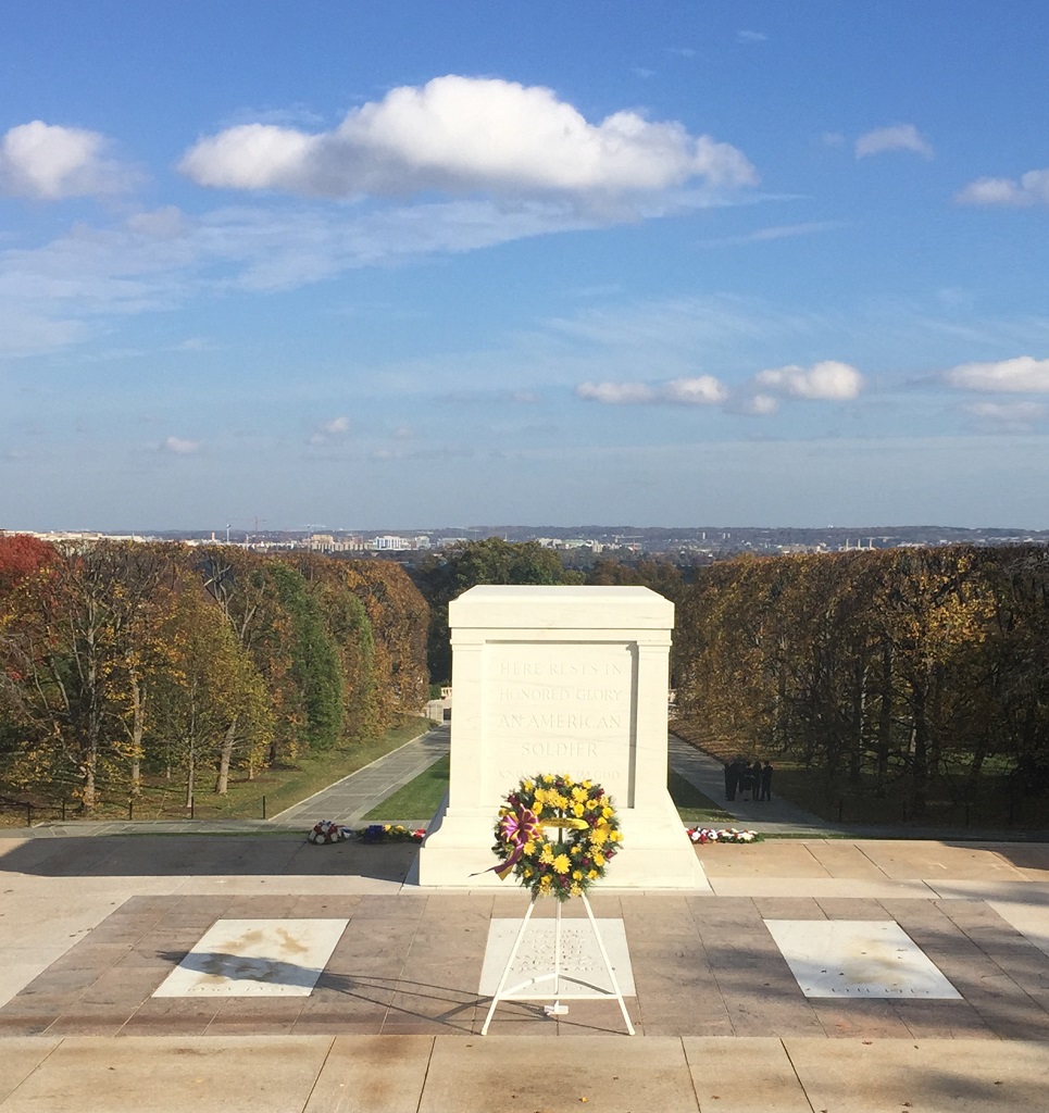 The Tomb of the Unknown Soldier, at Arlington National Cemetery, with downtown Washington, D.C. visible on the horizon. Suffering Is Not Wasted.